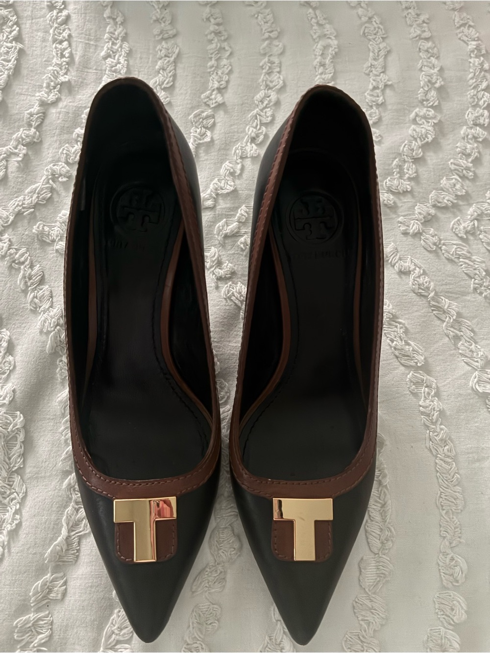 Tory Burch Black and Brown Pointed Toe Pumps with Gold-Tone Logo